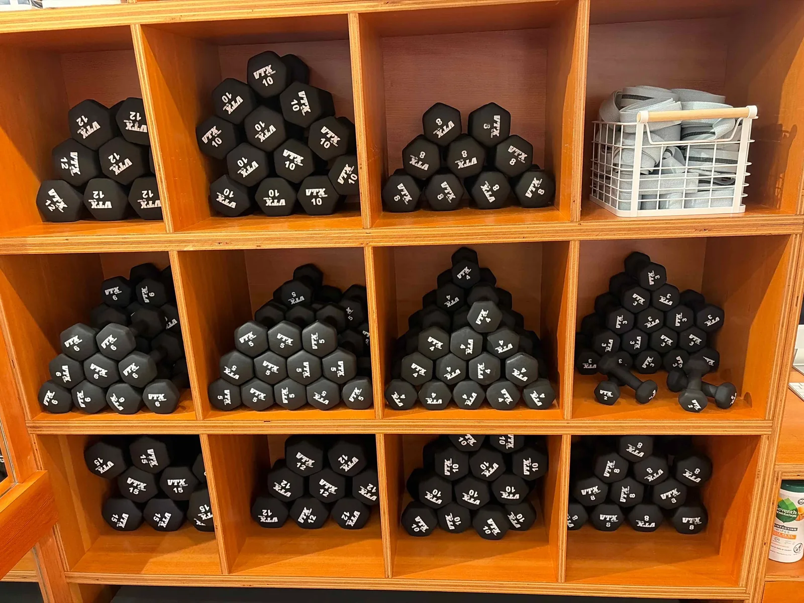 Organized dumbbell storage at barre3 Mount Pleasant