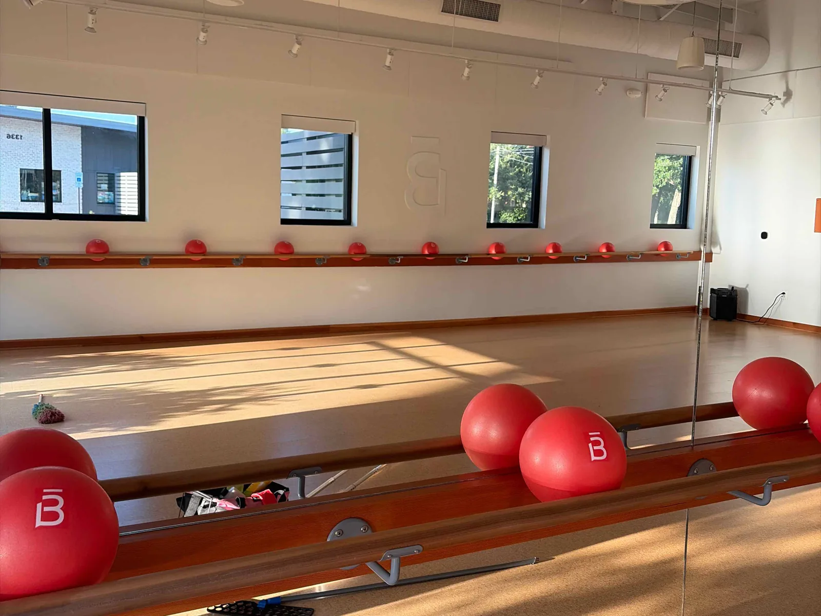 Clean mirrored barre studio floor at barre3 Mount Pleasant